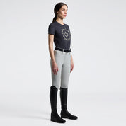 Cavalleria Toscana charcoal short sleeve T-shirt, front view, worn with light gray breeches and black tall boots
