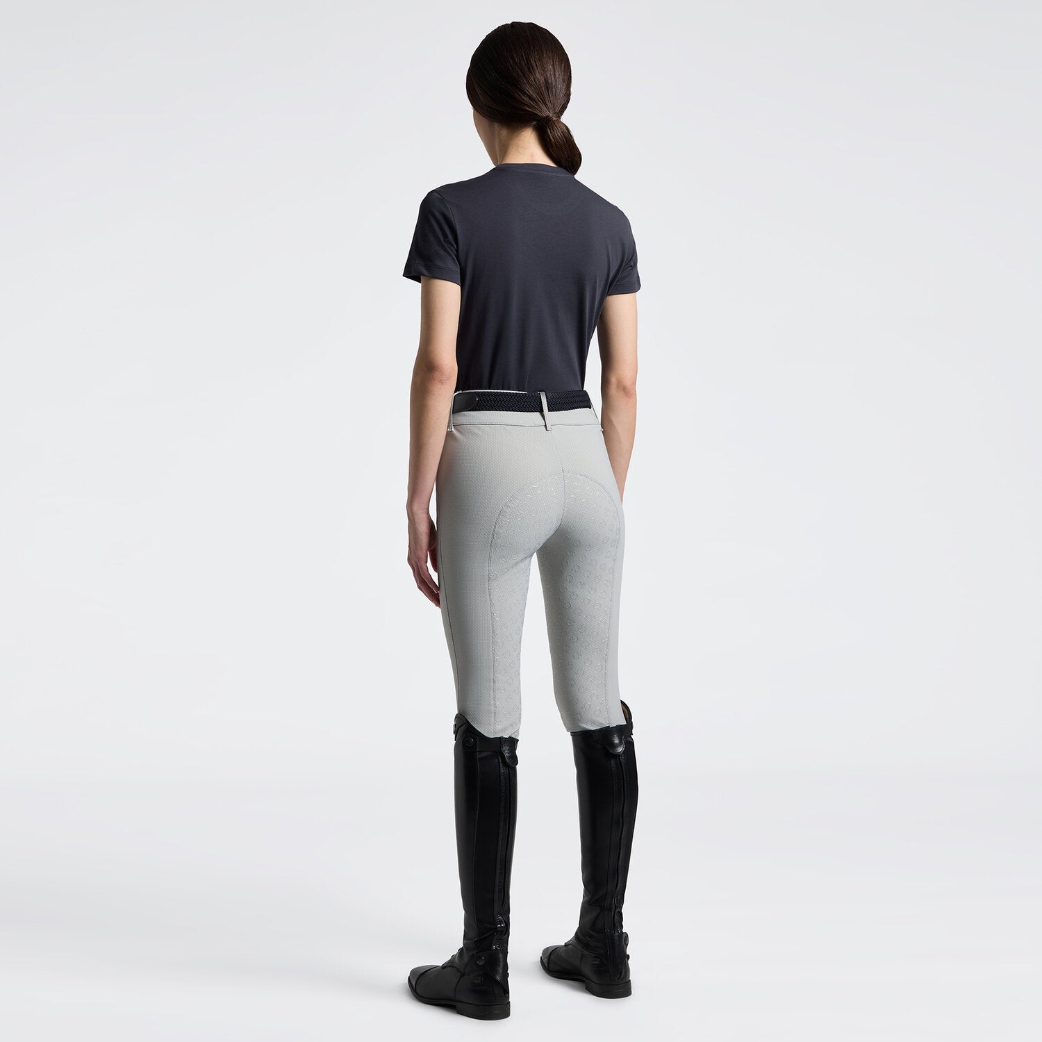 Cavalleria Toscana charcoal short sleeve T-shirt, back view, worn with light gray breeches and black tall boots
