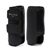 Front and back views of a pair of black Equilibrium Tri-Zone Impact Cross Country Hind Boot on a white background