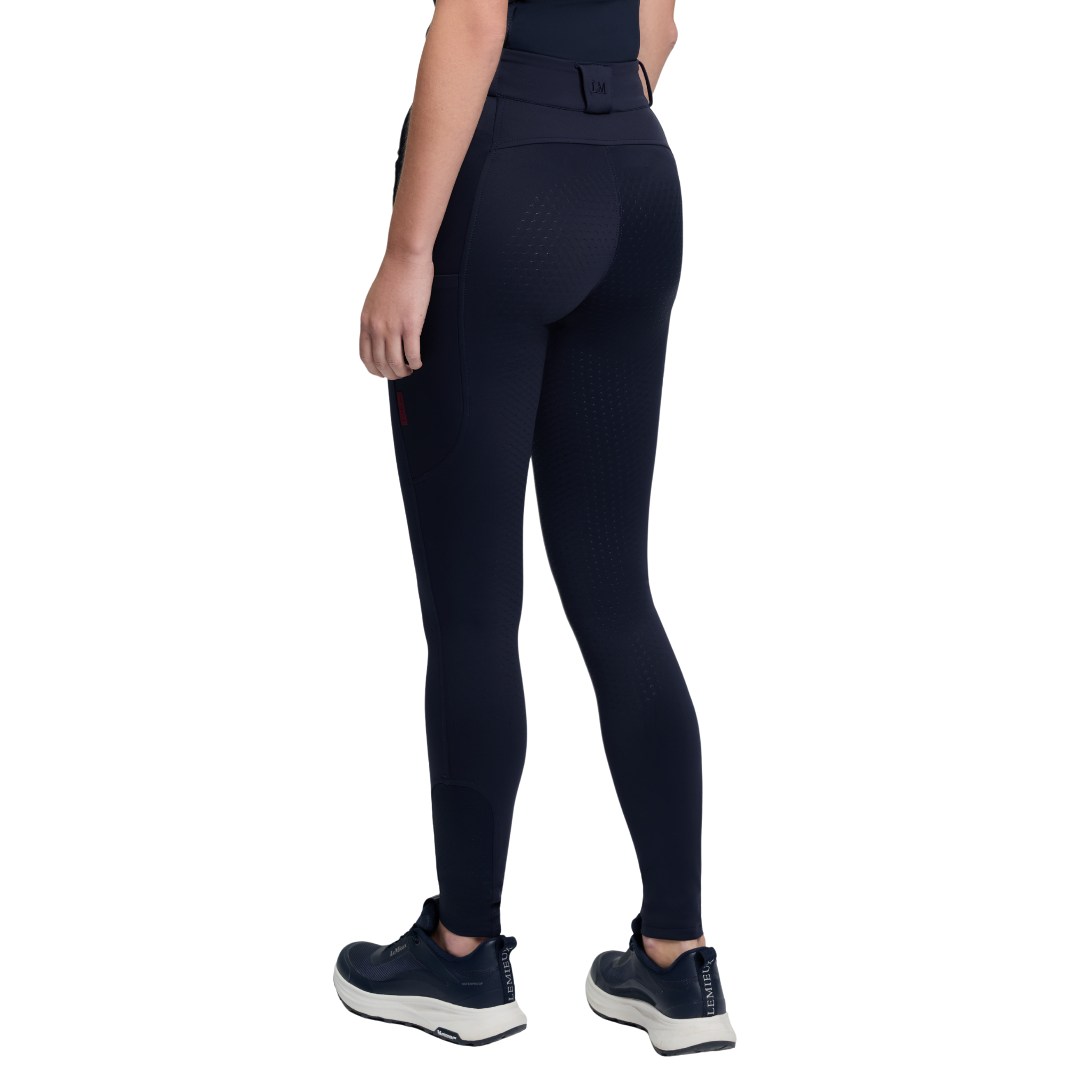 LeMieux Cami Sculpt Full Seat Breeches in navy, back view worn with black athletic shoes