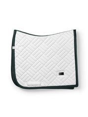Side view of the Dramatic Monday Dressage Saddle Pad on a white background
