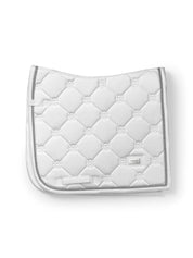 Side view of the Silver Equestrian Stockholm White Perfection Dressage Pad on a white background