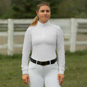 Outdoor front view of model wearing the Equinavia Petra Long Sleeved Show Shirt in white