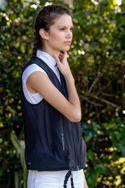 Angle side view of a model wearing the Helite Zip'In 2 Airbag in black