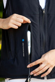 View of the Helite cartridge tucked away in the zipper pocket of the Helite Zip'In 2 Airbag in black