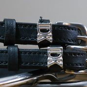 Close-up view of the buckled IDK Mane Jane Spur Straps