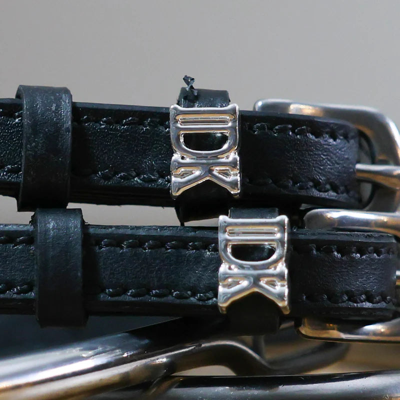 Close-up view of the buckled IDK Mane Jane Spur Straps