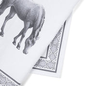 Close-up view of the Blue Stallion Farm Black & White Rocky Tea Towel on a white background