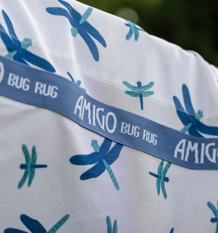 Close-up of Amigo Bug Rug Plus Fly Sheet in dragonfly pattern showing Amigo Bug Rug logo trim