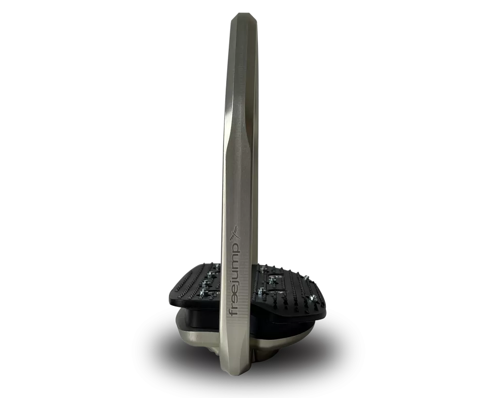 Side view of the silver Freejump Air Pure Stirrups on a white background