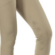 Close-up view of the silicone grip on the tan Horze Grand Prix Silicone Knee Patch Breeches on a white background