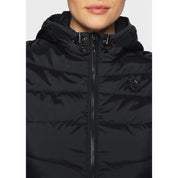 Close-up front view of a female model wearing the black Samshield Alta Badia Vest on a plain background