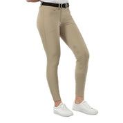 Angled front view of a model wearing the tan Horze Grand Prix Silicone Knee Patch Breeches on a white background