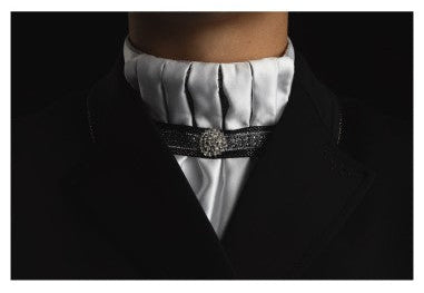 Close-up view of a model wearing the ANKY Pleated Crown Stock Tie under a black show coat