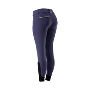 Angled back view of the blue Equinavia Kristina Knee Patch Breeches on a white background