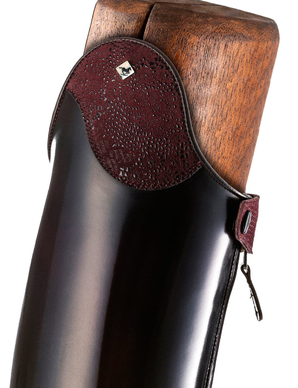 Close-up side view of the top of the DeNiro Raffaello Wrat Mosto Dressage Boot on a plain background