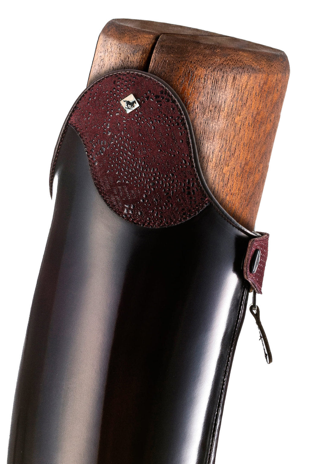 Close-up side view of the top of the DeNiro Raffaello Wrat Mosto Dressage Boot on a plain background
