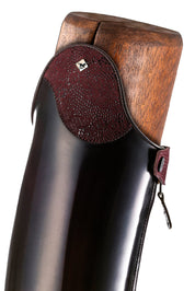 Close-up side view of the top of the DeNiro Raffaello Wrat Mosto Dressage Boot on a plain background