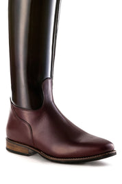 Close-up side view of the foot of the DeNiro Raffaello Wrat Mosto Dressage Boot on a plain background