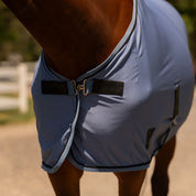 Front closeup view of a horse wearing Dusk Blue Equinavia Torr Quick Dry Cooler