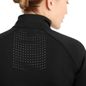 Close up back view of the perforations on the Horze Viveka Womens Perforated Training Jacket in black on a white background