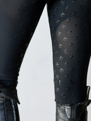 Close-up view of the silicone grip on the black Criniere Alice Full Seat Lightweight Full Seat Breeches