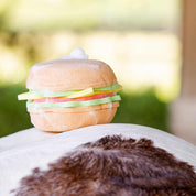 View of the Blue Ribbon Burger Bath Sponge sitting on top of a horse's bottom