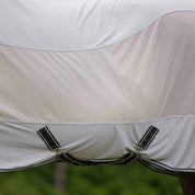 Close-up of breathable mesh body panel and belly straps on slate grey sheet
