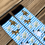 Close-up view of the Cash Money Dreamers & Schemers Pair & A Spare Boot Socks on a wood plank background