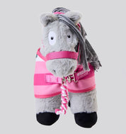 Front view of a gray stuffed pony wearing the pink Newmarket Fleece Cooler with matching pink halter and lead rope