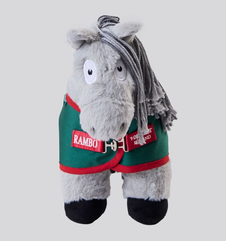 Front view of a gray stuffed animal pony wearing Rambo turnout blanket that is green with red accents