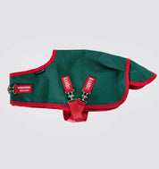 Side view of a Crafty Ponies Original Rambo Turnout Blanket in Green with red accents