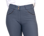 Close-up front view of a model wearing the slate blue KL Select Gabrielle Breech on a white background
