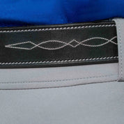 Close-up view of the stitching on the black Equinavia Filippa Fancy Stitch Bit Belt on tan breeches