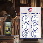 Spray bottle of fly repellent sitting on a stool inside a barn next to a horse