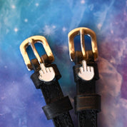 Close-up view of the Middle Finger Mane Jane Spur Straps on a galactic background