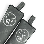 Front view of a pair of Black Designer Bit Posh Pony Boot Stuffers on a white background