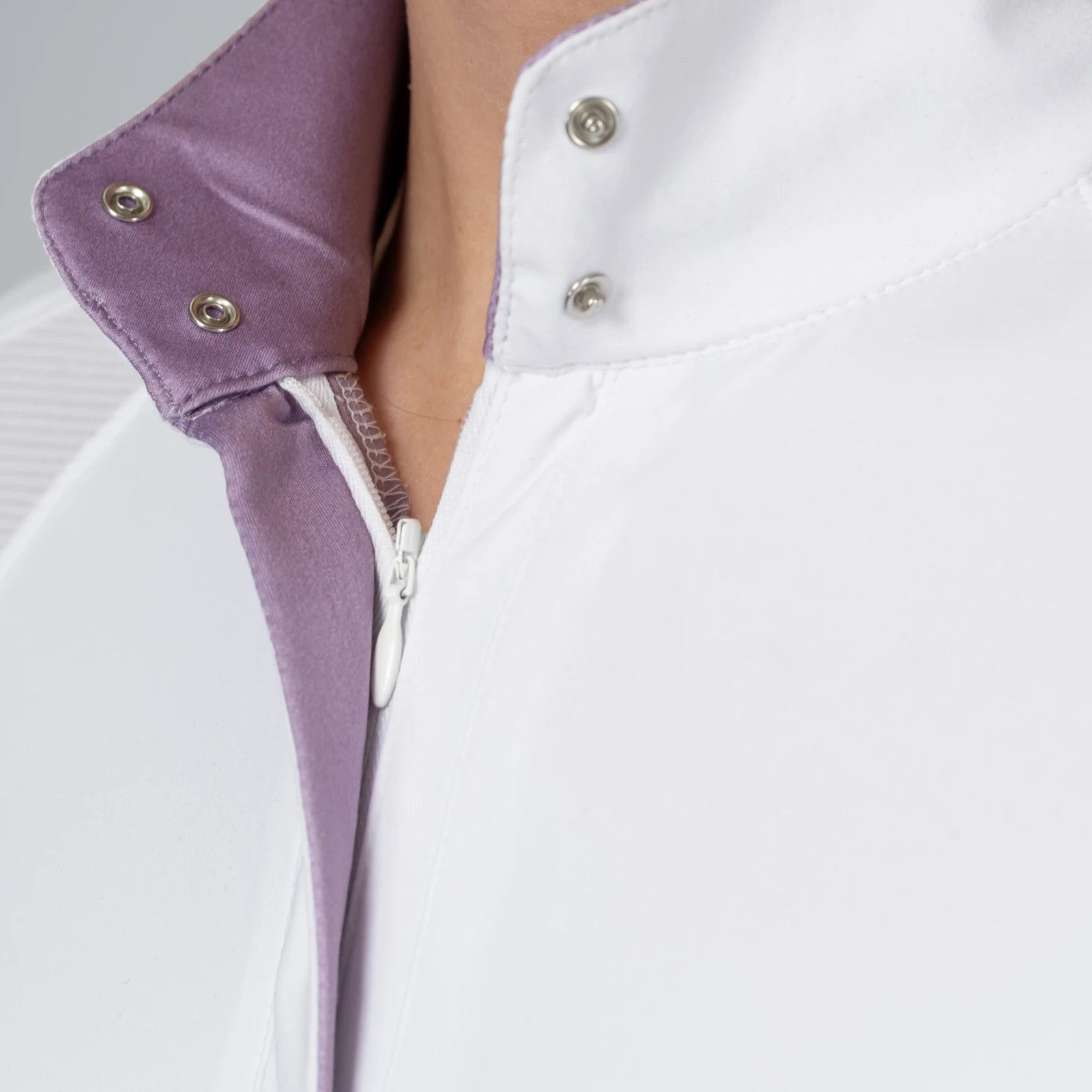 Close-up view of the orchid accents on the Equinavia Sonja Long Sleeve Show Shirt