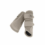 Inside and outside views of a pair of Pale Grey Eskadron Mesh Tendon Boots on a white background