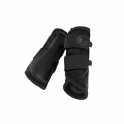 Inside and outside views of a pair of black Eskadron Mesh Tendon Boots on a white background