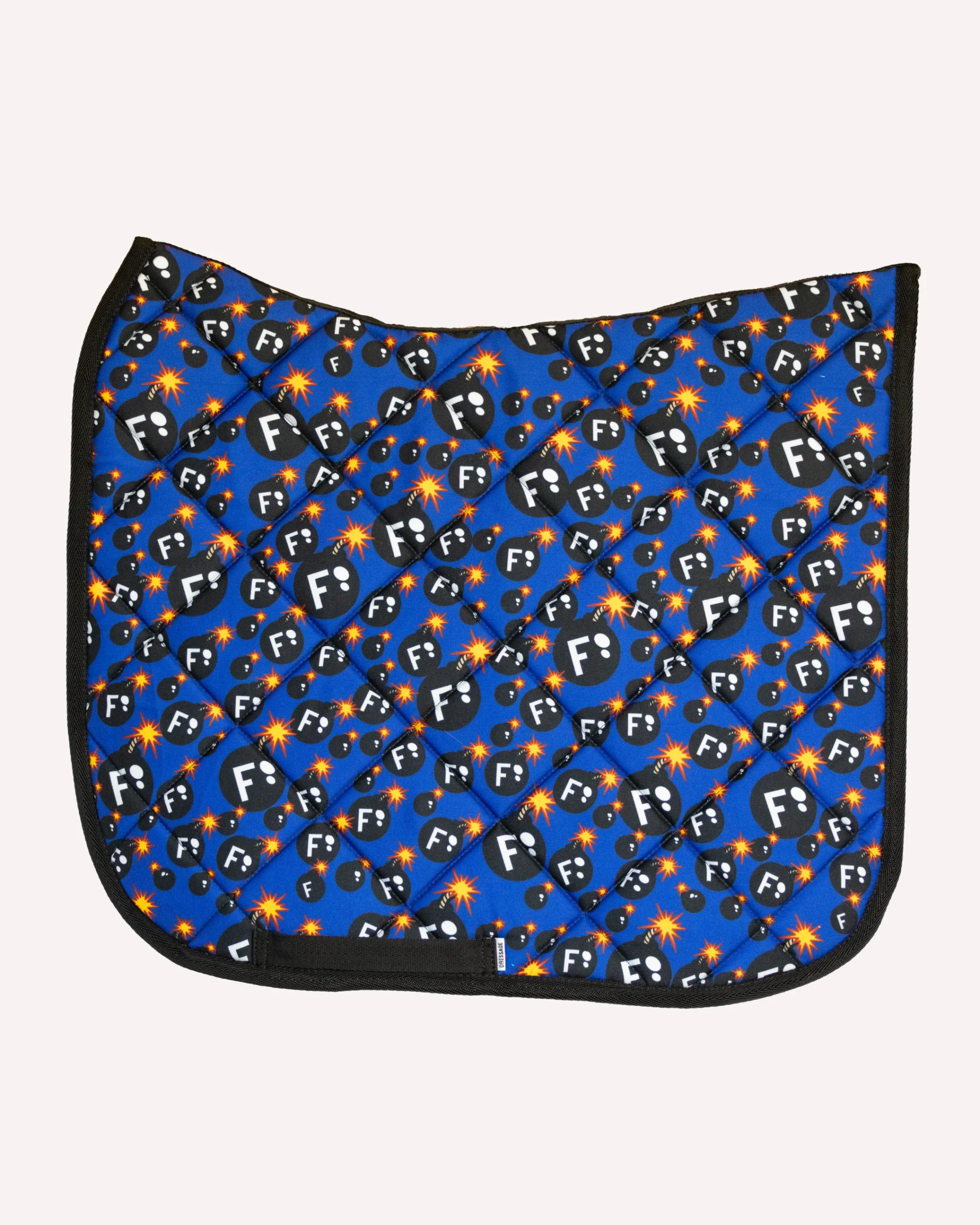 Side view of the F Bomb Dreamers & Schemers Saddle Pad on a white background