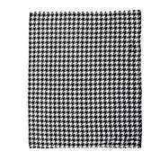Full view of the Blue Stallion Farm Black & White Houndstooth Flannel Fleece Blanket in Leather Holder on a white background