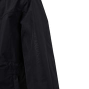 Close-up view of the sleeve on the navy Horze Fiora Kids Lightweight Waterproof Jacket on a white background