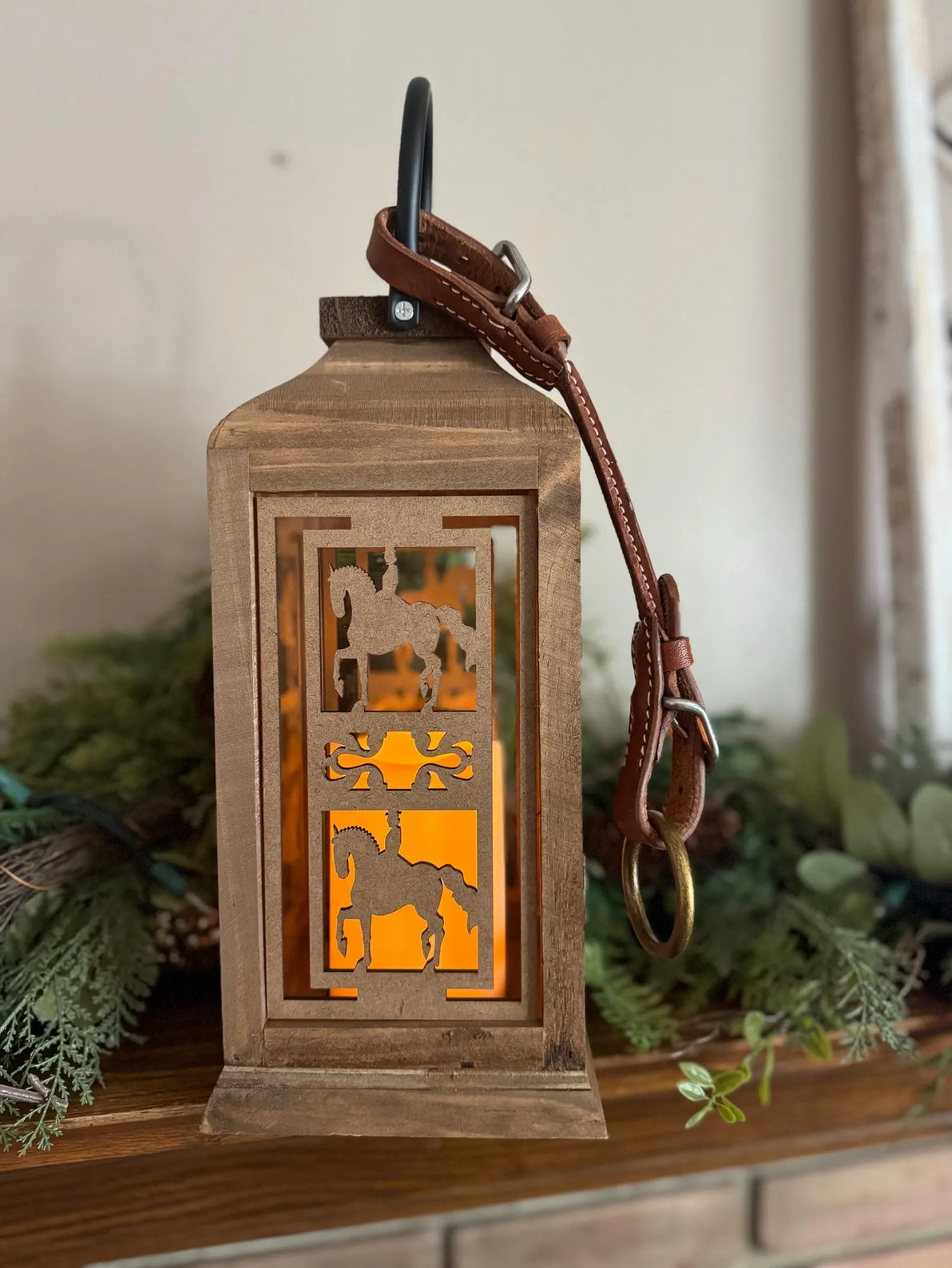 Side view of the dressage All Designs Equine Horse Lantern sitting on a mantle