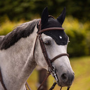 Front view of a gray horse wearing the black embroidered Samshield Flyshield Fly Veil