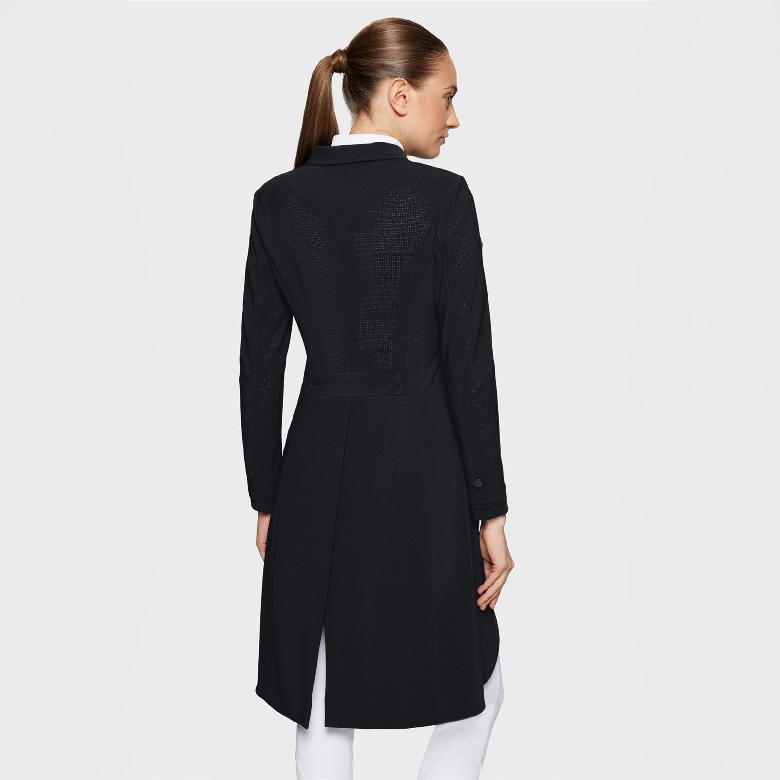Back view of a female model wearing the black Samshield Frac Air on a plain background