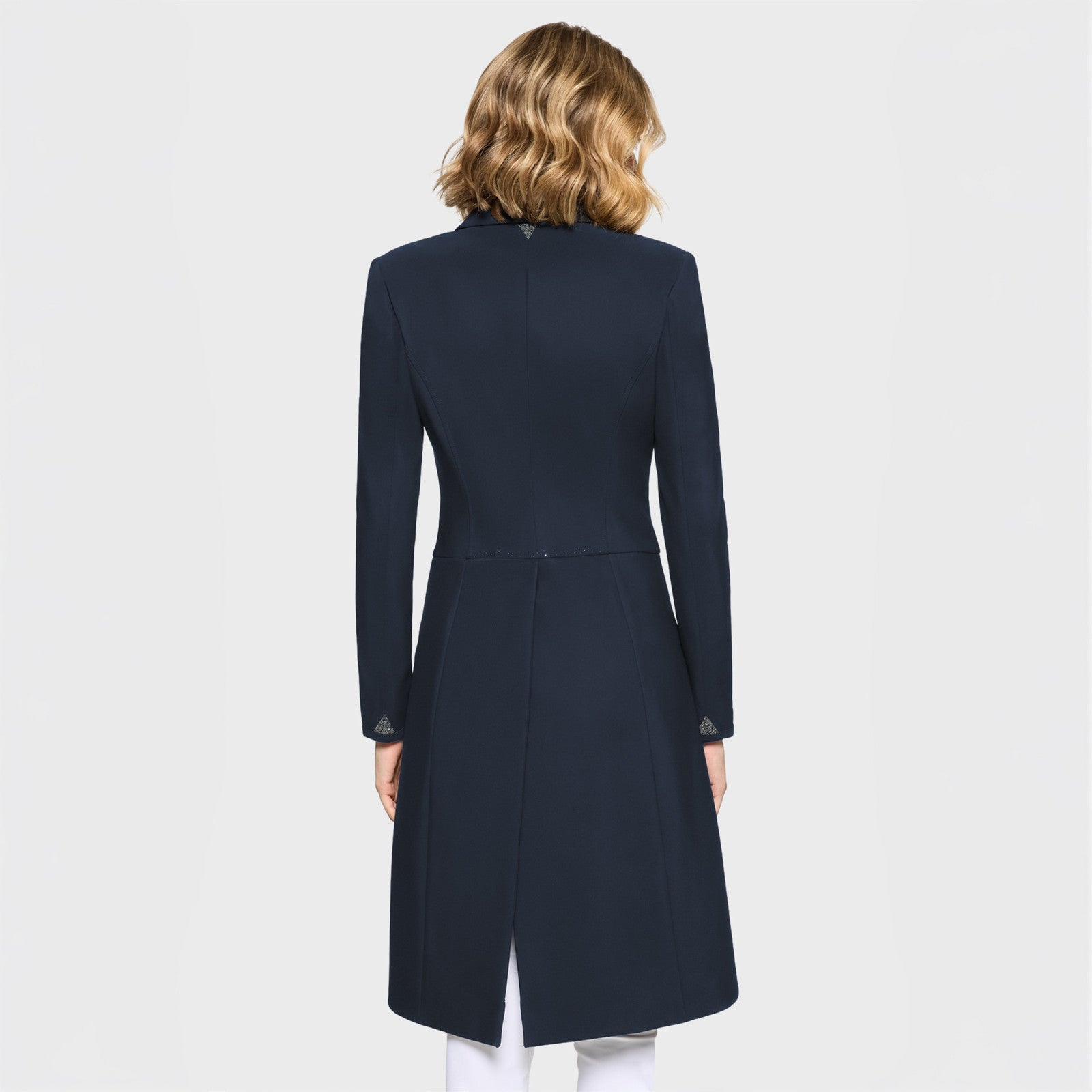 Back view of a female model wearing the Navy Samshield Frac Crystal Fabric Show Coat on a plain background