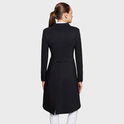 Full body back view of a female model wearing the black Samshield Premium Frac on a plain background