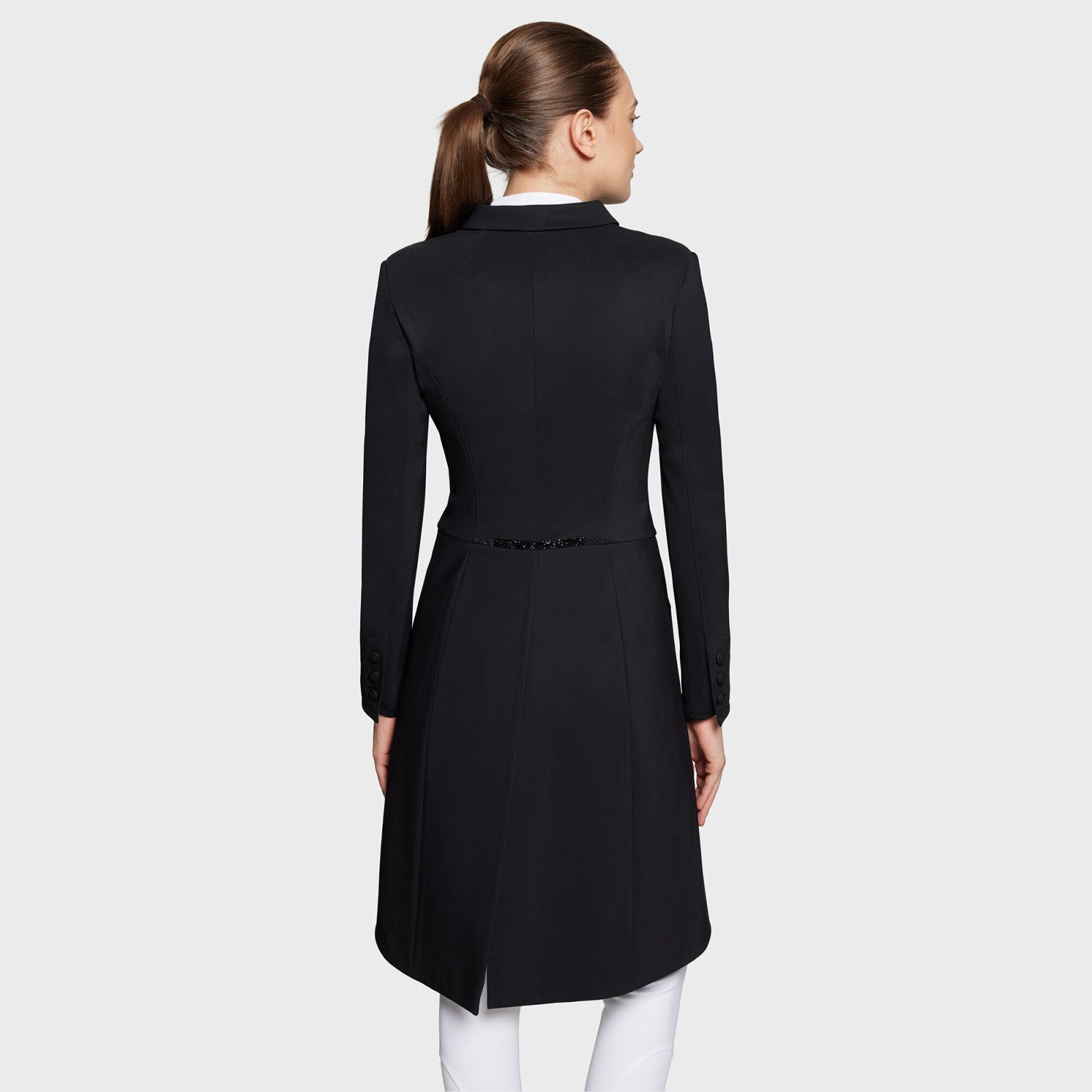 Full body back view of a female model wearing the black Samshield Premium Frac on a plain background