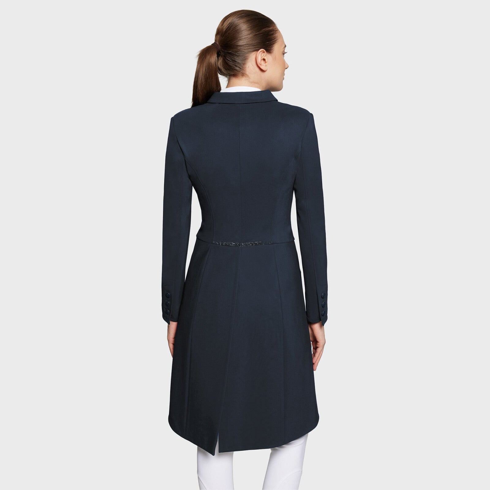 Full body back view of a female model wearing the black Samshield Premium Frac on a plain background